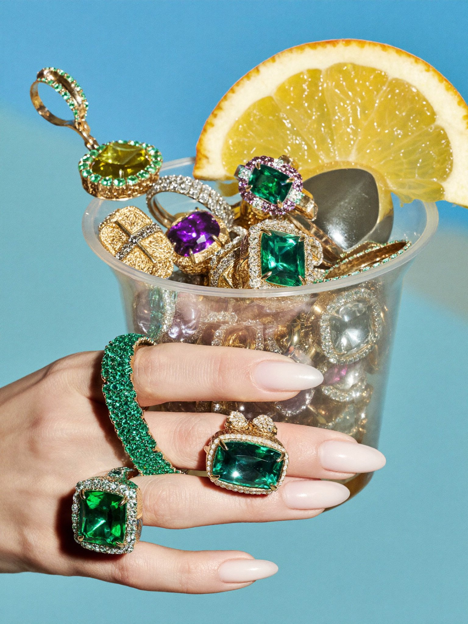 Emerald rings in a cocktail glass